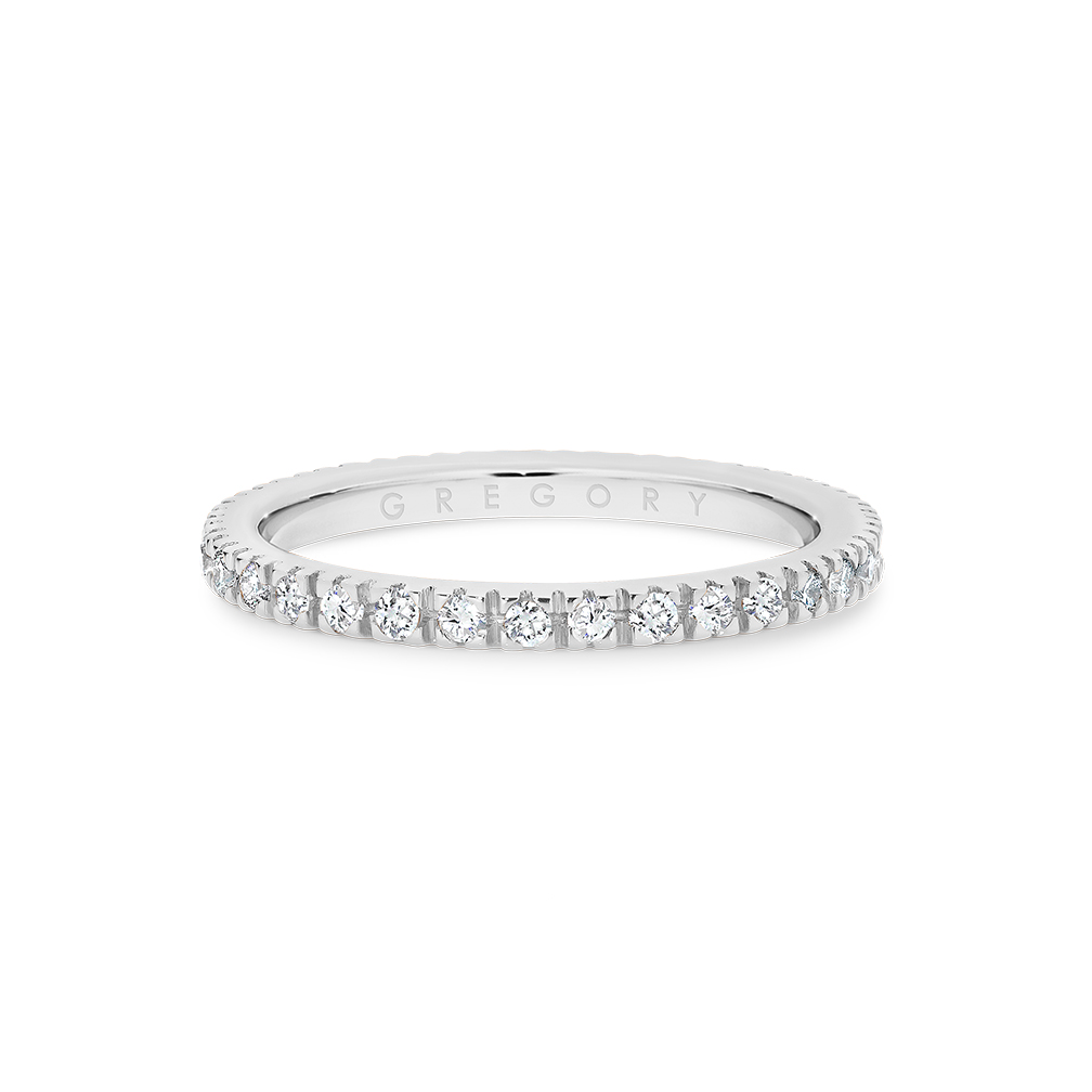 Claw Set Diamond Eternity Band in White Gold