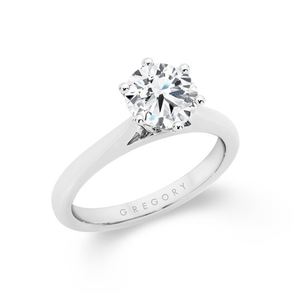 Round Brilliant Solitaire Six Claw Diamond Engagement Ring with a Plain band. Model: A2262