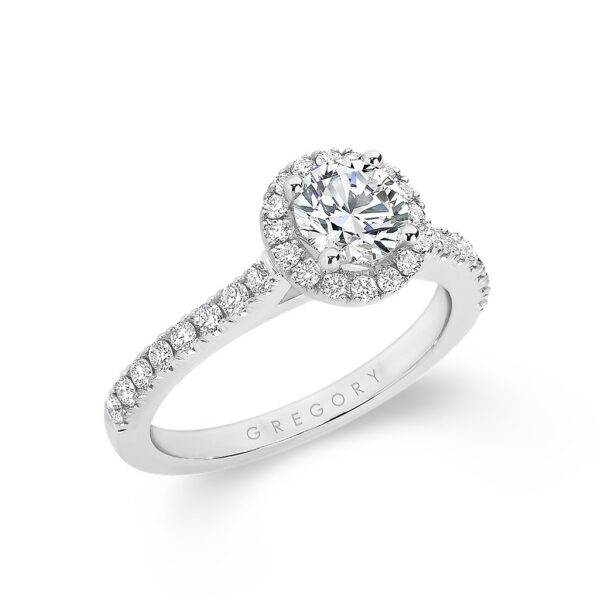 Round Brilliant Halo Diamond Engagement Ring in white gold or palladium with shoulder stones. Model: A2287