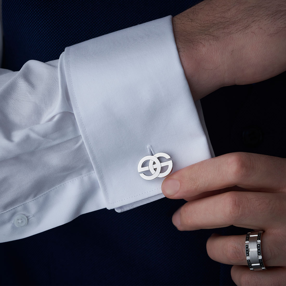 Silver cufflinks with all-over logo