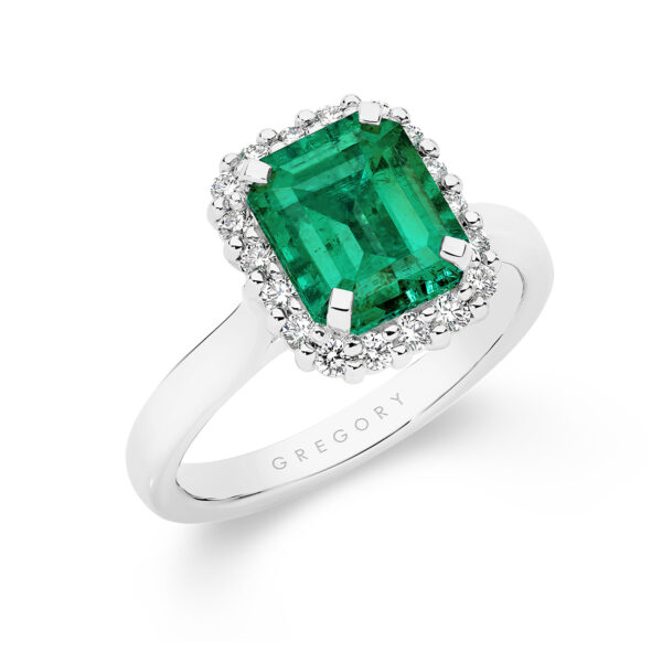 Green Emerald and Diamond Halo Ring In 18K White Gold - E1046