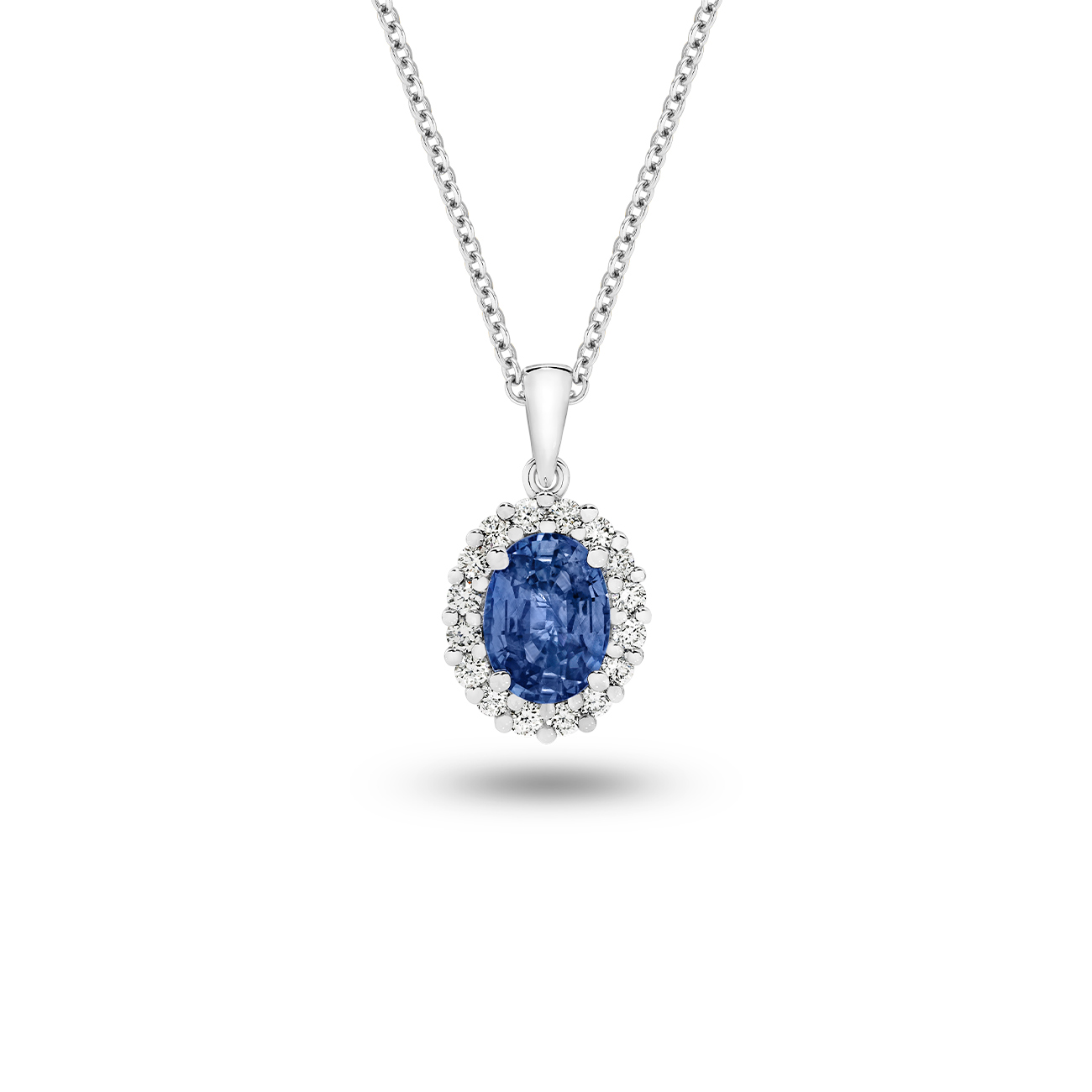 Oval Blue Sapphire and Diamond Halo Pendant in 18K White Gold