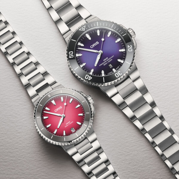 ORIS Aquis Date Taste of Summer watch with red-pink gradient dial and stainless steel bracelet