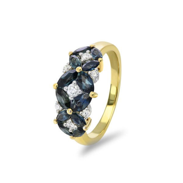 Primrose ring with floral cluster of marquise cut blue sapphires and white diamonds in 18k yellow and white gold