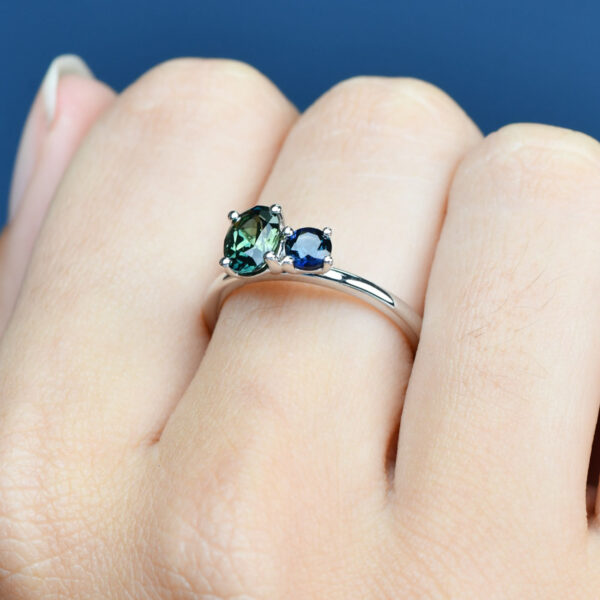 Toi Et Moi ring with oval cut parti sapphire and round blue sapphire in 9k white gold