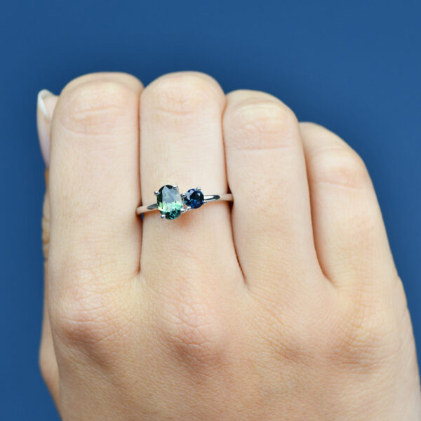 Toi Et Moi ring with oval cut parti sapphire and round blue sapphire in 9k white gold