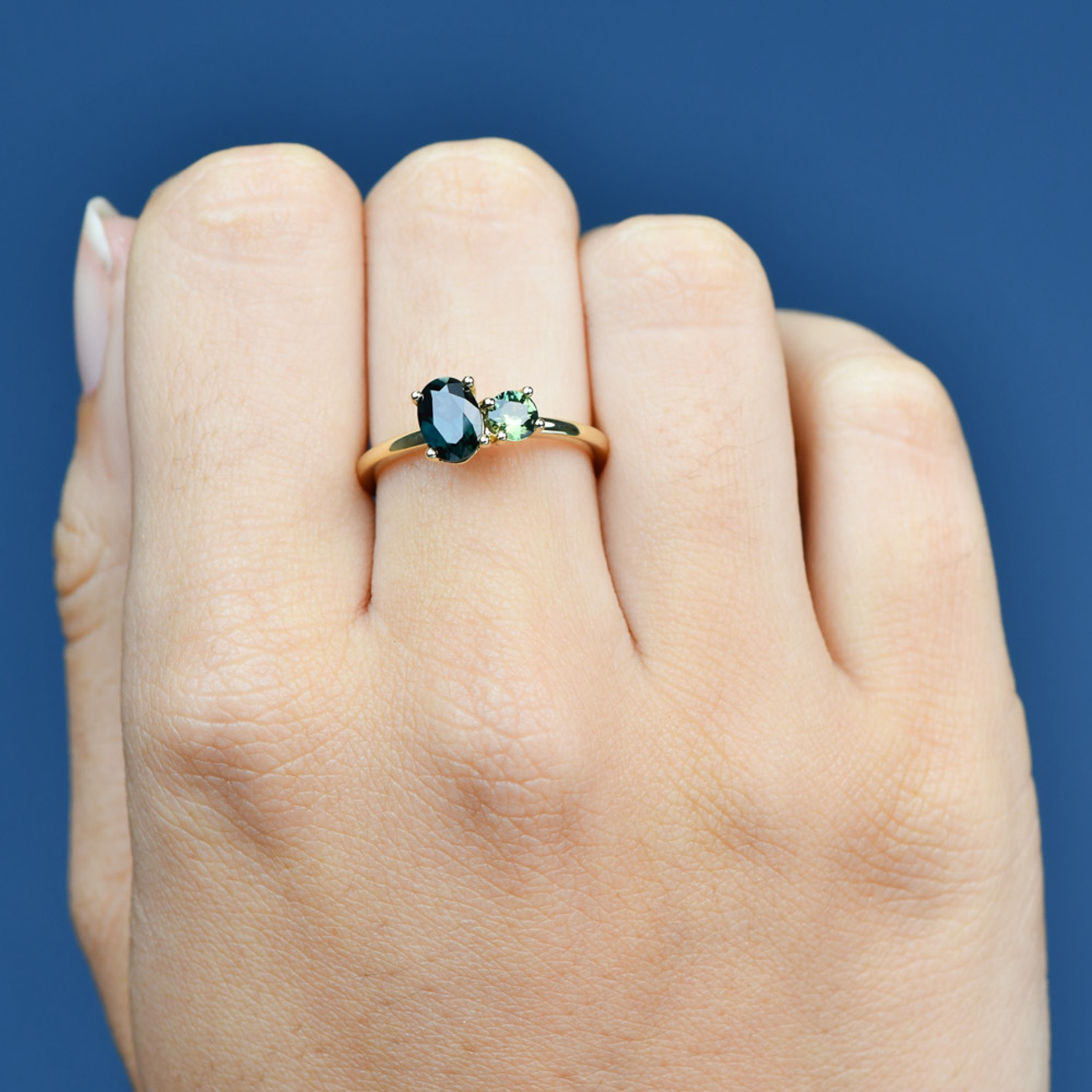 Blue & Parti Australian Sapphire Toi Et Moi Ring in 9ct Yellow Gold Blue and Parti Australian Sapphire Toi Et Moi Ring in 9ct Yellow Gold featuring oval and round brilliant cut stones