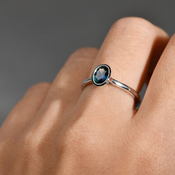 Blue Australian Sapphire Adelia Ring with oval cut sapphire bezel set in 9k white gold