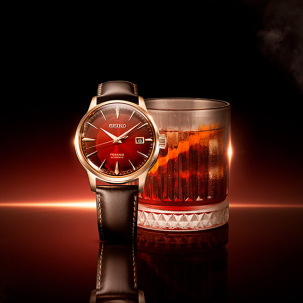 Seiko Presage Cocktail Time 'The Conte' Limited Edition SRPL96J with red textured dial, rose-gold toned case and brown leather strap - lifestyle