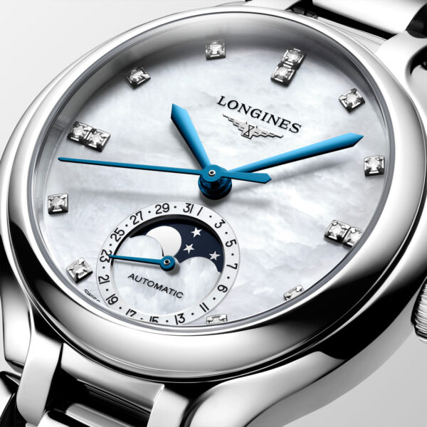 Longines Primaluna Moonphase 34mm L81264876 with white mother-of-pearl dial, 14 diamond indices, moonphase complication and steel bracelet - close up dial