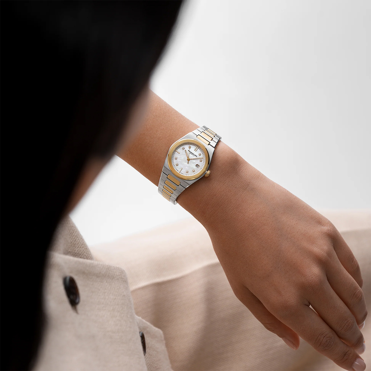 Raymond Weil A.R.T. 1250-STP-97081 Two-Tone Quartz Watch Raymond Weil A.R.T. 1250-STP-97081 ladies two-tone quartz watch with mother-of-pearl dial and integrated bracelet - lifestyle