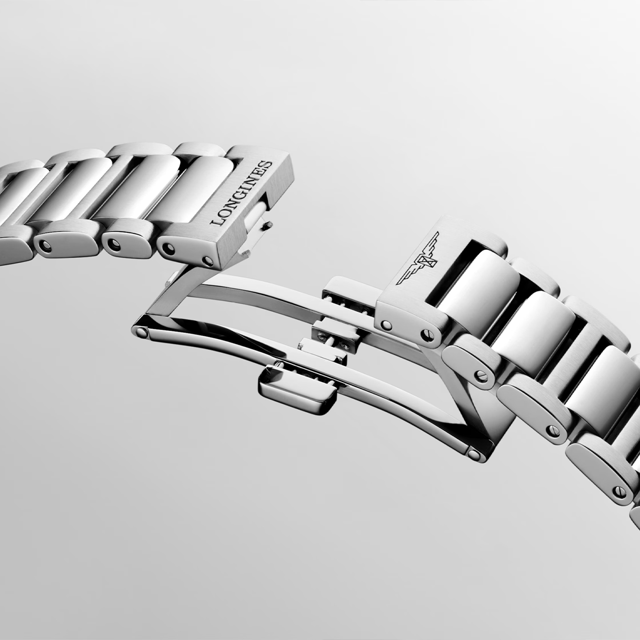 Longines Conquest Stainless Steel Folding Clasp – L3.350.4.02.6 Longines Conquest L3.350.4.02.6 stainless steel bracelet with triple safety folding clasp and push-button opening mechanism