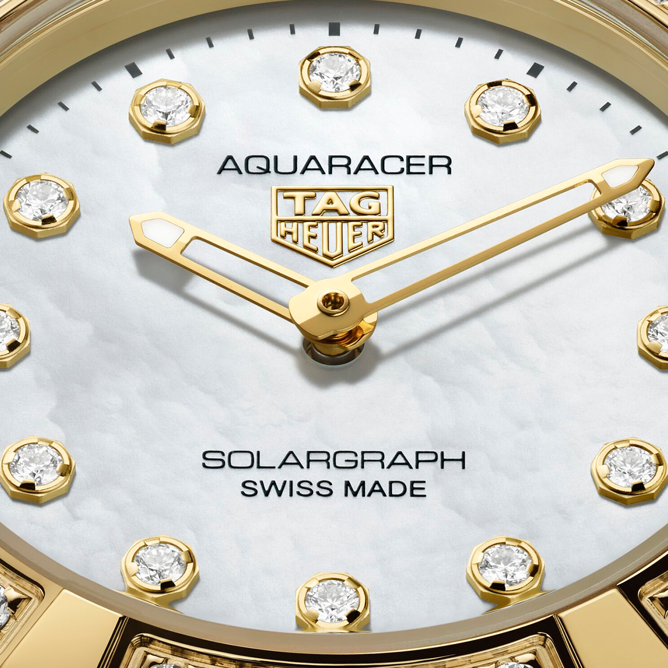 TAG Heuer Aquaracer Professional 100 Solargraph WBP1420.BB0006 28mm TAG Heuer Aquaracer Professional 100 Solargraph WBP1420.BB0006 diamond bezel white mother of pearl dial watch - close up