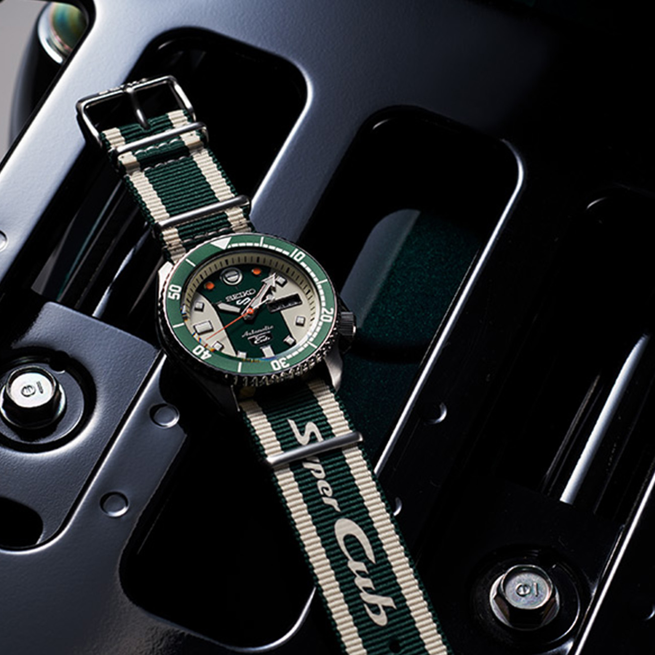 Seiko 5 Sports SRPJ49 Super Cub Limited Edition Watch Seiko 5 Sports SRPJ49 Super Cub Limited Edition automatic watch with green and cream dial and nylon strap